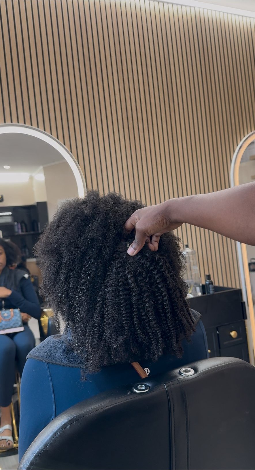 Raw Coily Curl texture, styled in salon